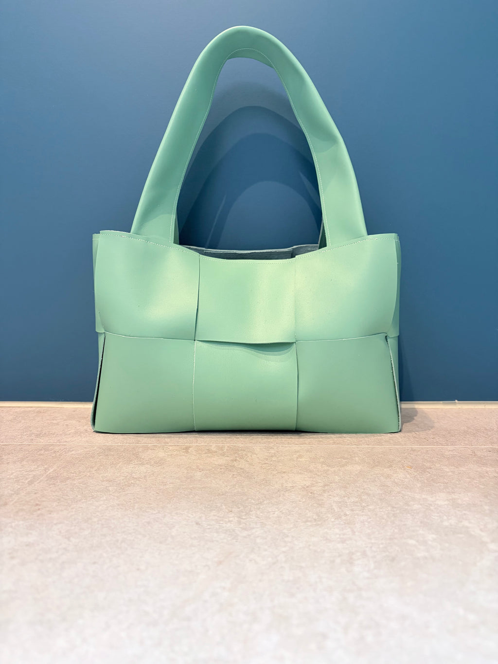 Mint green "woven" leather bag