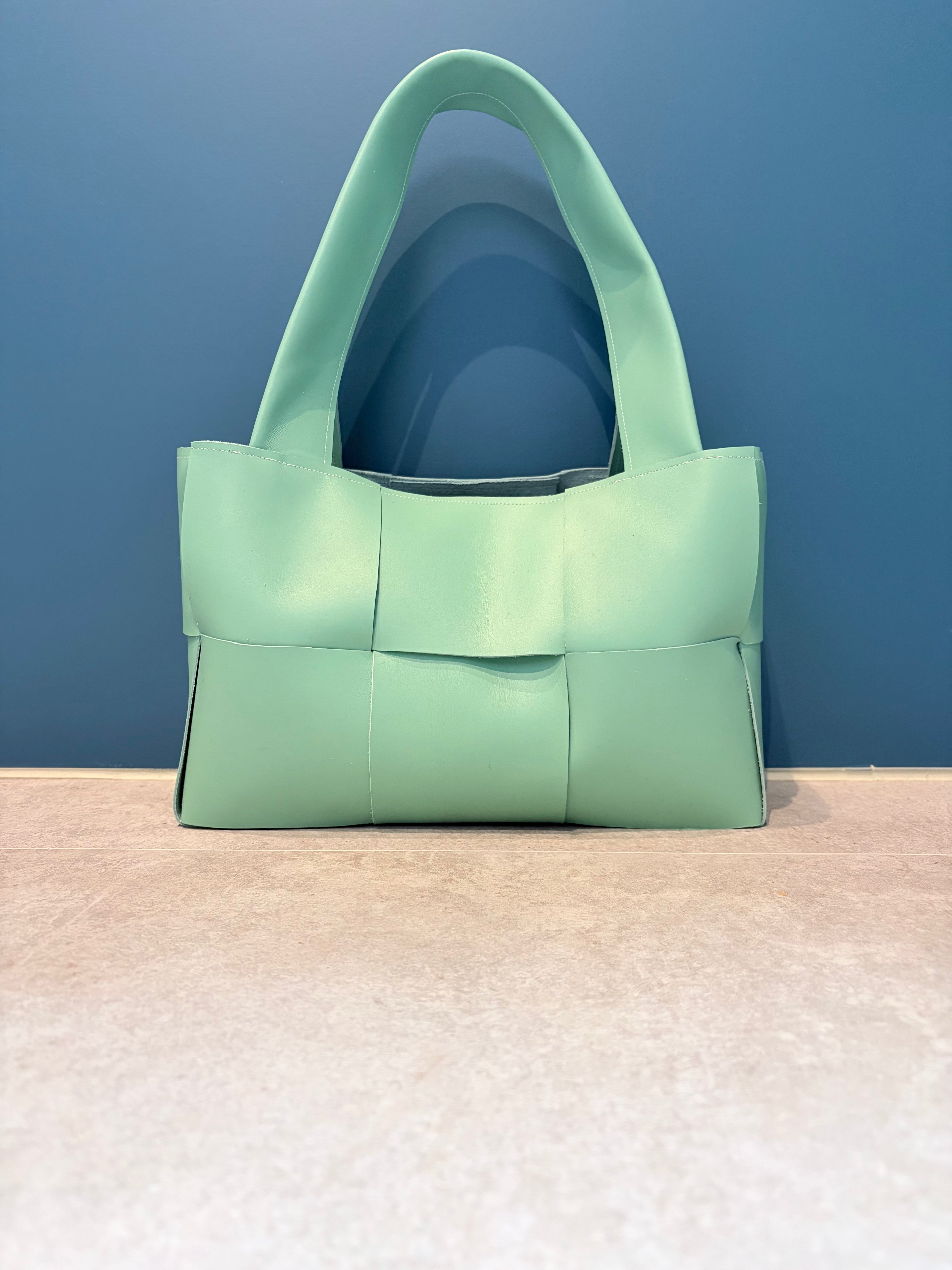 Mint green "woven" leather bag