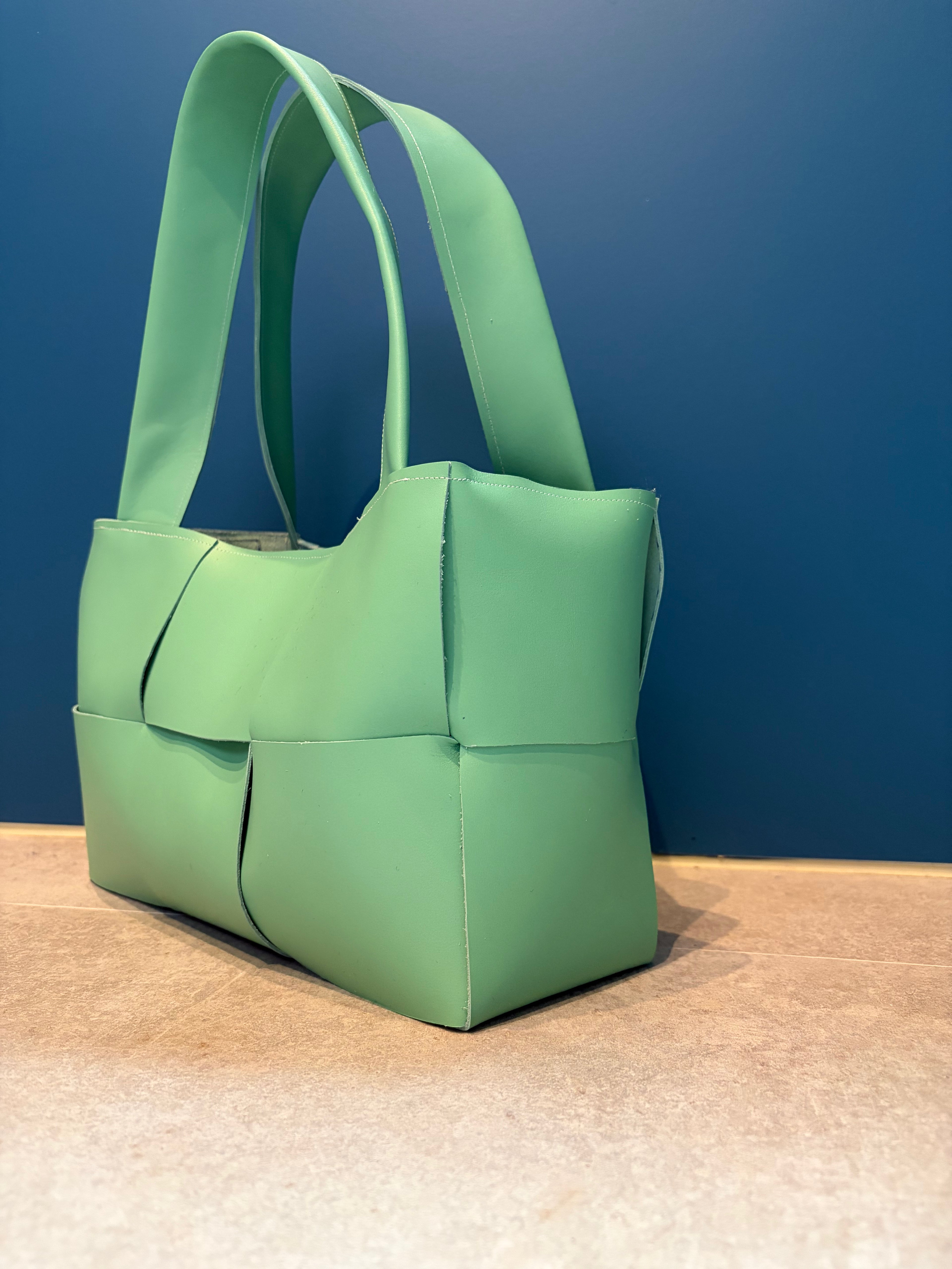 Mint green "woven" leather bag
